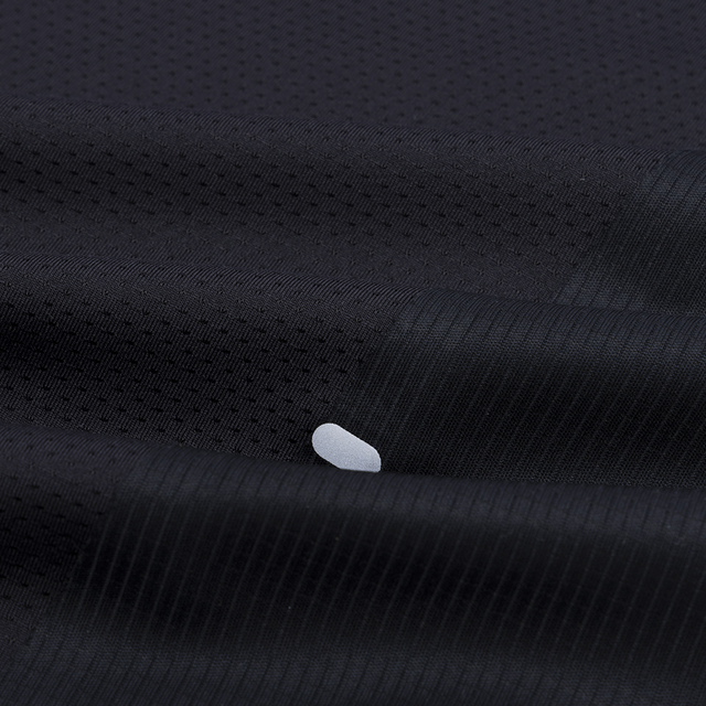Fractel-Velocity-women_s-race-Singlet-Black-close