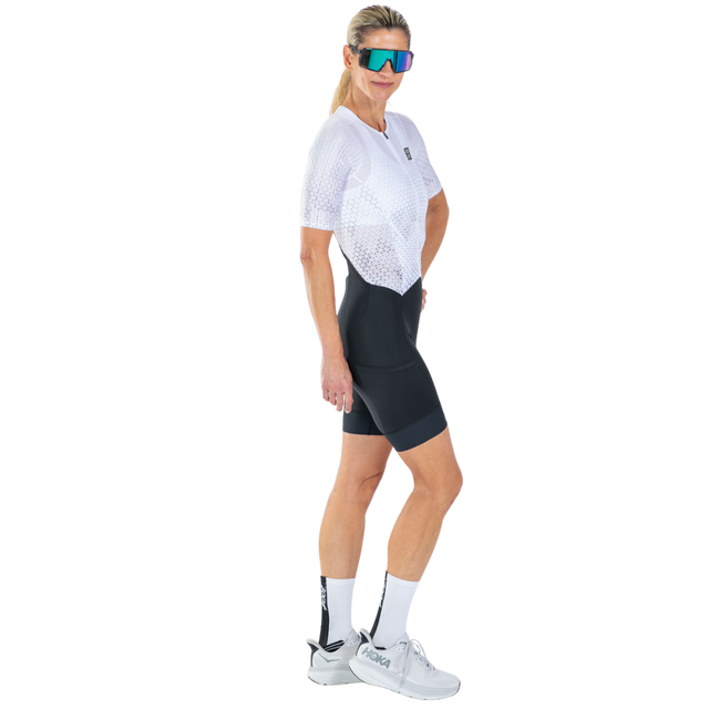 Zoot Women's Elite P1 Tri Aero FZ Racesuit in Sonic White colourway - front angle view (right)